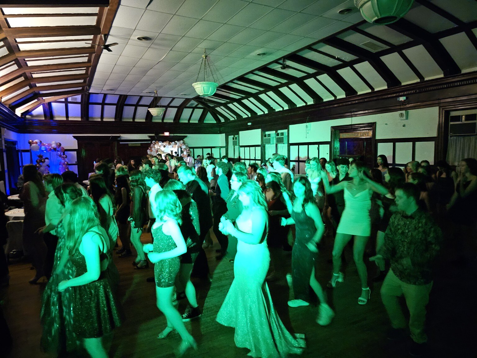 Guests celebrating together on the dance floor